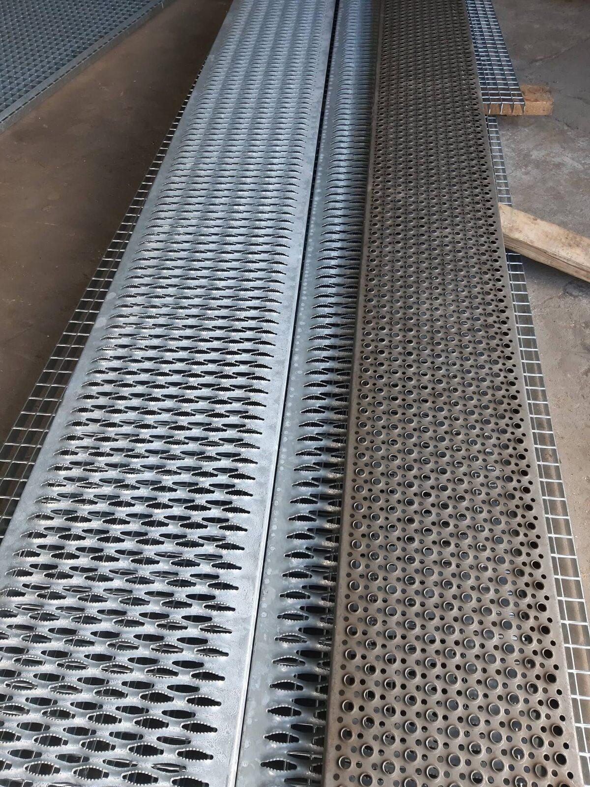 Anti-slip steel planks with pressed openings and round perforation