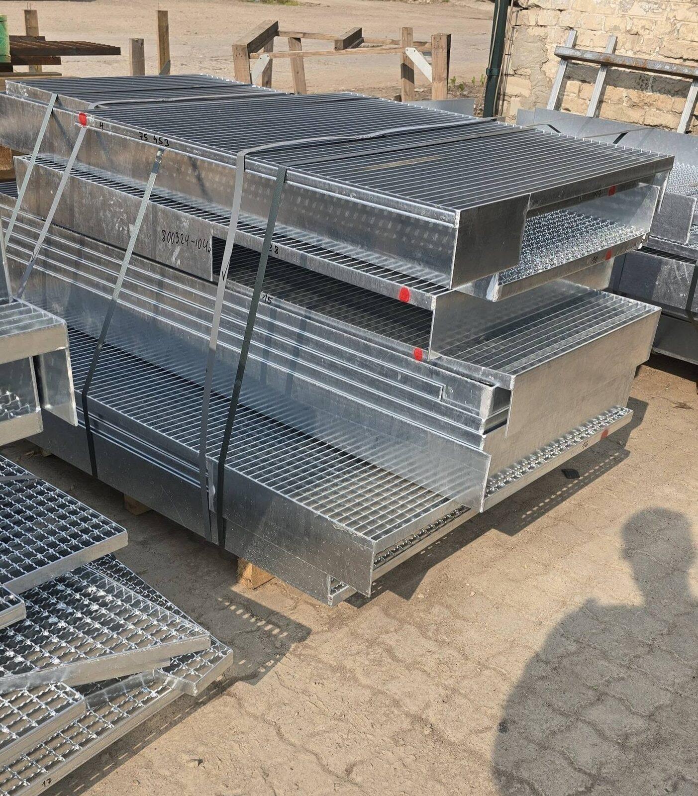 Galvanized welded grating and a steel stair tread