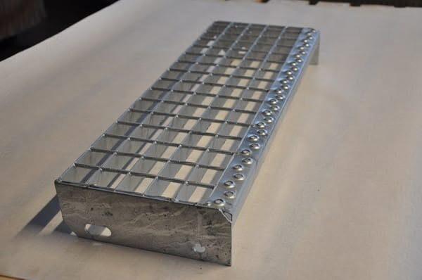 Stair tread, anti-slip nosing and bearing bars